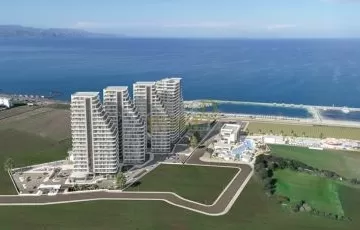 Kuzey Kıbrıs'ta panoramik deniz manzaralı 5 yıldızlı otel konseptli satılık daireler